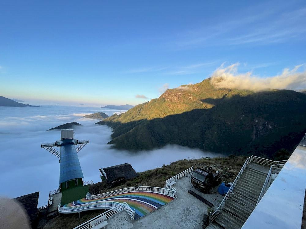 The Rong May Glass Bridge is a spectacular tourist attraction in Sapa, offering visitors an exhilarating experience high above the mountains